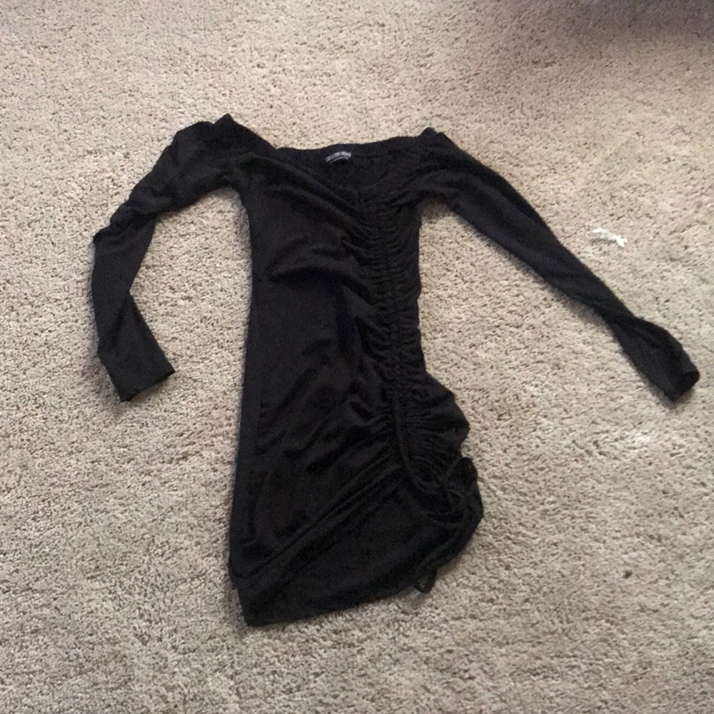 Black off the shoulder dress.